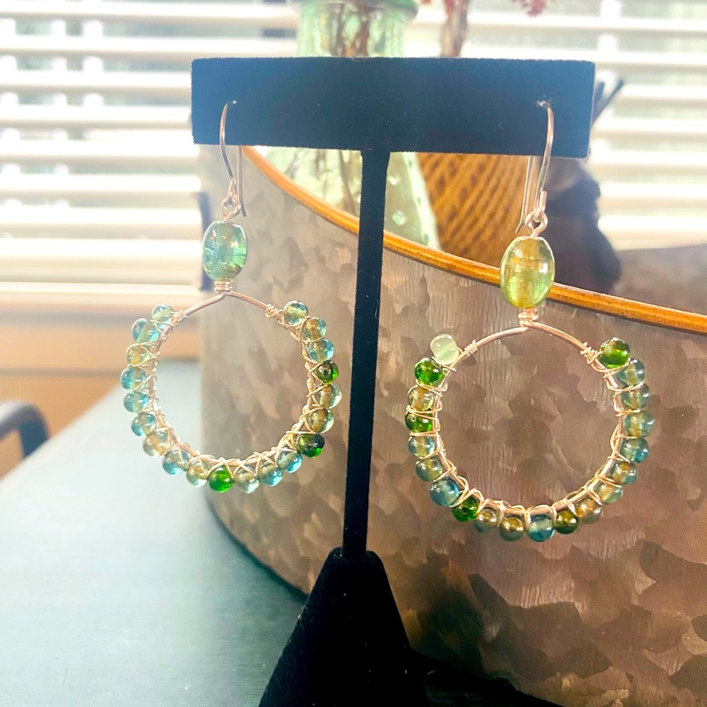 Green glass & gold earrings